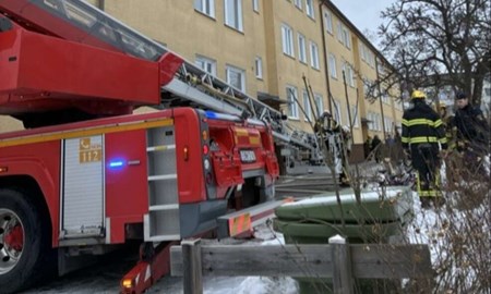 Brand i flerfamiljshus i centrum