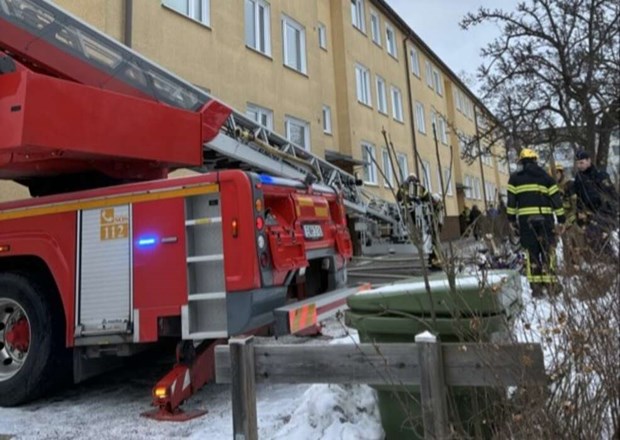 Brand i flerfamiljshus i centrum